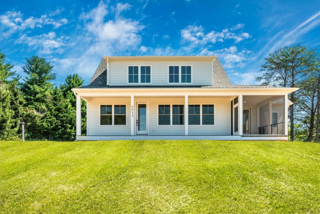 Classic White Porch Farmhouse