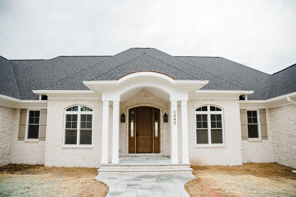 Elegant Arched Entry Custom Home